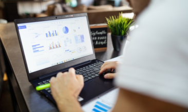 Person looking at restaurant plan ideas on a laptop