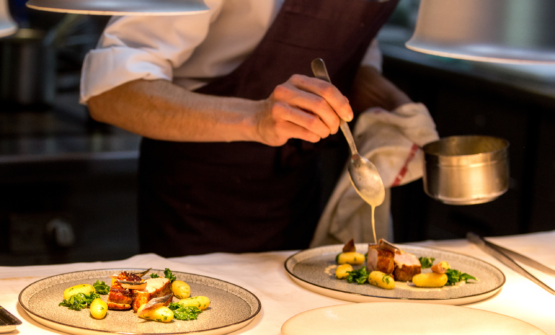 Chef preparing dishes in a restaurant