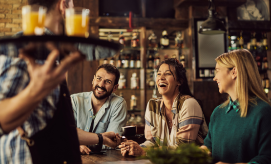 Bar team laughing with bar consultants